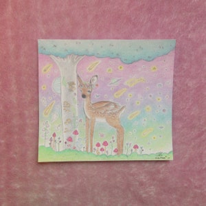May include: A hand-drawn illustration of a deer with a flower crown standing in a forest with a tree, mushrooms, and a starry sky. The deer is brown and white with a pink nose and a pink flower crown. The background is a gradient of pink, purple, and blue with stars and shooting stars.