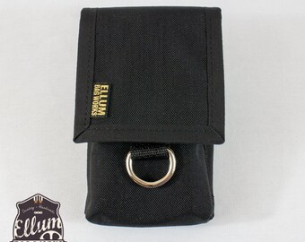 May include: Black utility pouch with a silver D-ring and a gold label that reads "ELLUM BAG WORKS".