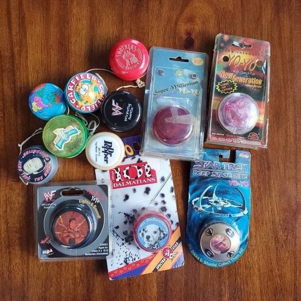 Vintage Yo-Yo's PICK 1: New WWF The Rock, WWF Sable, Garfield, New Smothers Brothers, Star Trek Data, Deep Space Nine, 101 Dalmatians New