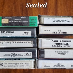Vintage 8 faixas ESCOLHA 1 Algumas novas/lacradas Algumas usadas: Ozzy Osborne Diary of a Madman, Goldfinger Music Score, Star Wars, Sly & The Family Stone