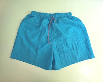 Pantaloncini da calcio vintage in nylon, colore blu petrolio, taglia Large ma vestono come una Medium da uomo. LEGGI i dettagli. Pantaloncini sportivi vintage.
