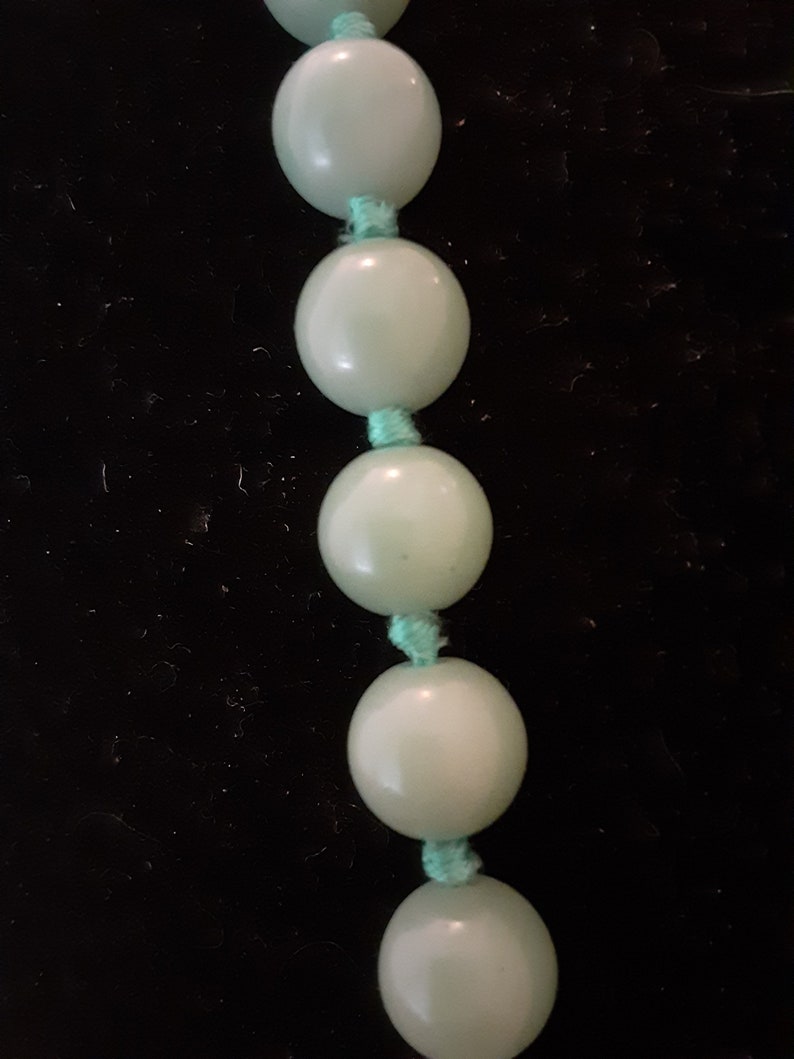 Mid century Jade bead necklace silk string light green