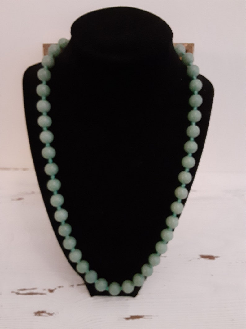 Mid century Jade bead necklace silk string light green