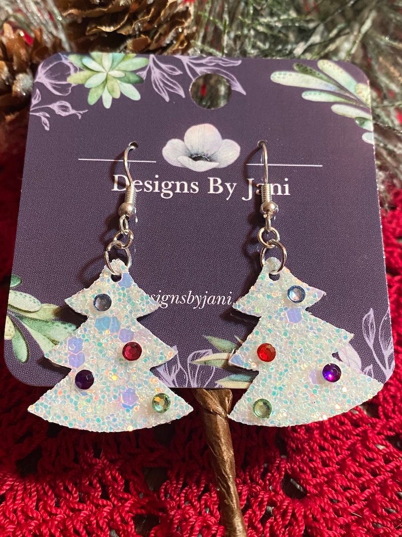 Ornamented white Christmas tree 1\u201d earrings with lead and nickel free hypoallergenic silver findings.