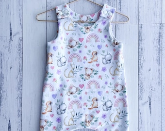Pelele de bebé con estampado de animales australianos arcoíris: koala, ornitorrinco y canguro.
