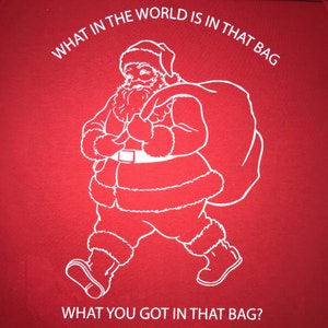 what in the world is in that bag christmas t shirt funny cute santa claus ludacris rap hip hop pun kids toddler top holiday tee boys girls