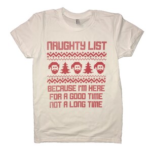 May include: White t-shirt with a red Christmas-themed design. The design features a red and white pattern with three cartoon faces and the text "Naughty List Because I'm Here For A Good Time Not A Long Time".