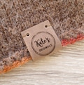 Product labels, center fold leather labels, crochet labels, folding labels, leather tags, branding logo labels, personalized leather labels product logo