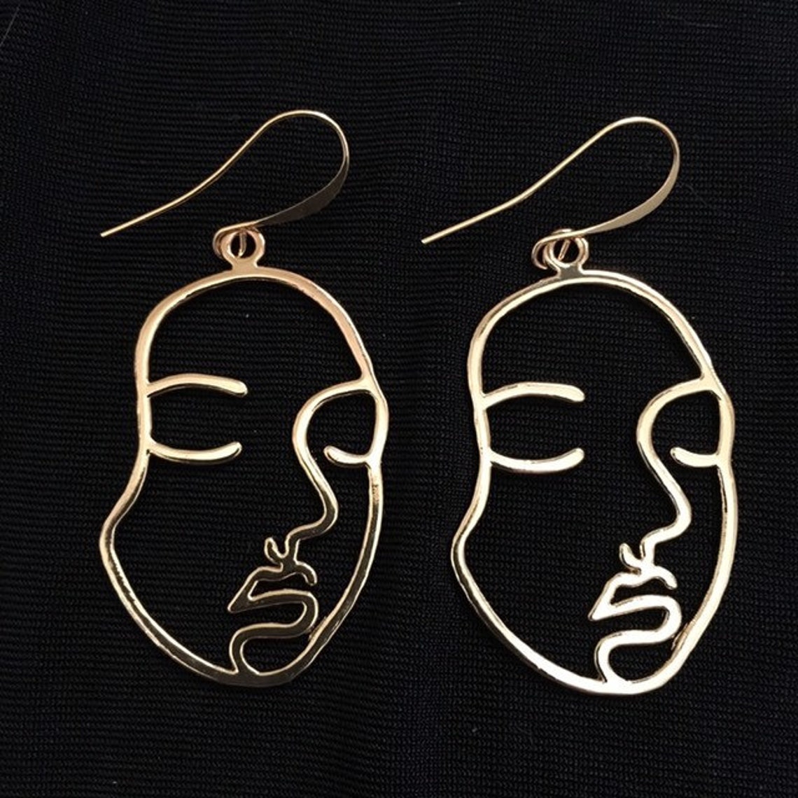 Face outline earrings Clearance