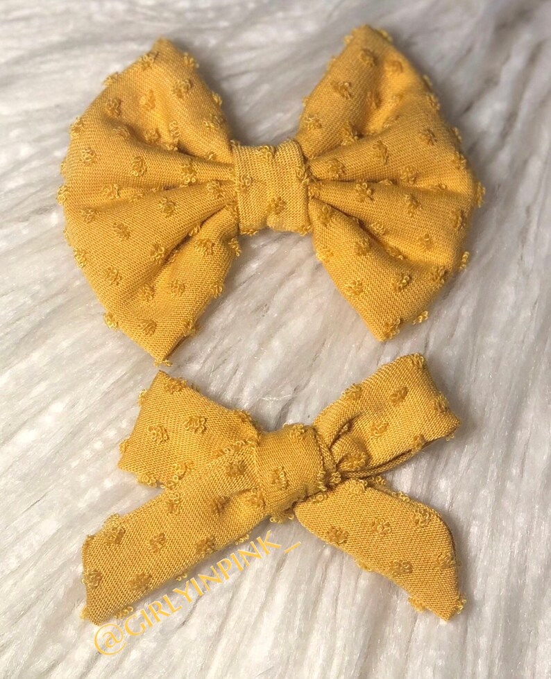 Yellow dotted bows