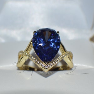 7 ct. AAA Tanzanite an Diamond Ring Comes in 14k Yellow Gold Plated and 14k White Gold Plated Sterling Silver
