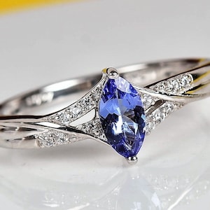 AAA Tanzanite an White Sapphire in Platinum over .925 Sterling Silver Ring Size    9 an 10