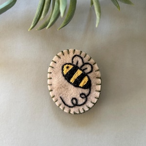 A Felt Bumble Bee Brooch