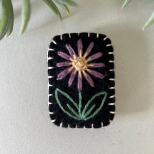 A felt flower brooch