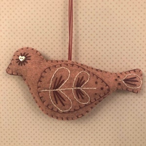A Handmade Felt Bird with Embroidery