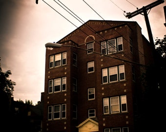 Marked -Fine Art Photograph  Sepia with Muted Color Tones, The Shoes Wrapped Around the Power Lines in Front of Building Mark This Building