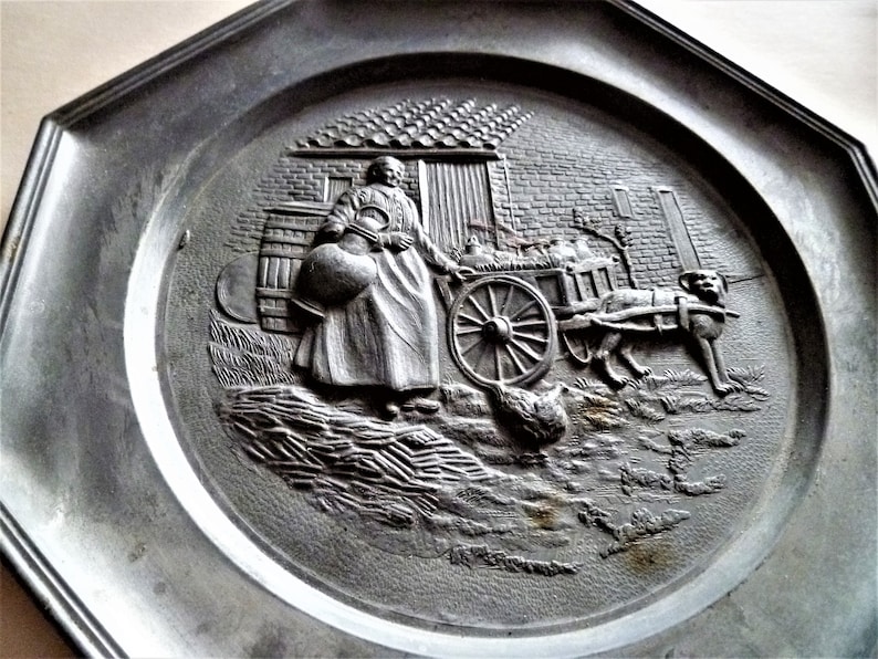 full carriage with products and loose chicken and dog ready to haul big Vintage Pewter Plate depicting Farm Lady carrying Huge Milk Jar