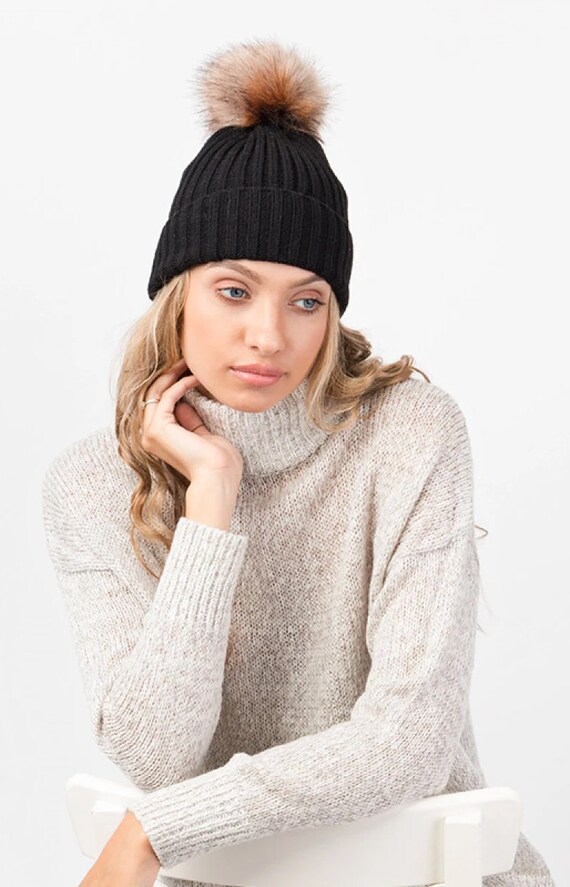 black bobble hat with brown bobble