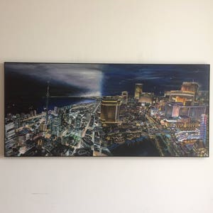 May include: A painting of a city skyline at night, with a mix of modern and traditional buildings. The sky is dark blue with a few stars visible. The city is lit up with lights, creating a vibrant and colorful scene.