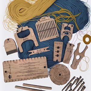 May include: A selection of wooden weaving tools, such as a weaving board, shuttle, heddle, and bobbin, alongside blue and yellow yarn. The tools are crafted from light-coloured wood and are designed for different weaving methods.