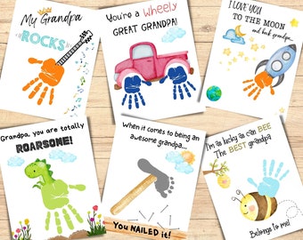 Può includere: Una collezione di stampe artistiche ad acquerello con impronte di mani per il nonno. I disegni includono una chitarra, un camion, un razzo, un dinosauro, un martello e un'ape, tutti creati con impronte di mani. Il testo include frasi come "Il mio nonno spacca".