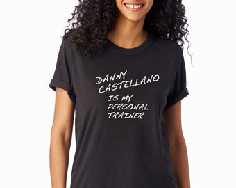 Puede incluir: Camiseta negra con texto blanco que dice "Danny Castellano is my personal trainer".
