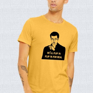 May include: A yellow t-shirt with a black graphic of a man with the text "He'll flip ya flip ya for real".