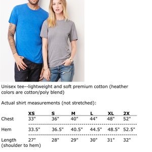 May include: Size chart for a unisex t-shirt, showing measurements in inches for chest, hem, and length from shoulder to hem. Sizes range from XS to 2XL.
