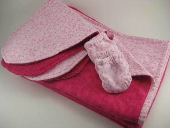Pink and white star flannel receiving baby blanket with two terry cloth burp clothes and two pairs of reversible scratch mitts