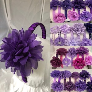 May include: Purple, lavender, and burgundy fabric flower headbands. The headbands are made with a variety of different fabric flowers, including roses, daisies, and carnations. The headbands are perfect for adding a touch of elegance to any outfit.