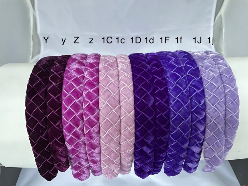 May include: Ten velvet headbands in various shades of purple, from dark to light, with a quilted diamond pattern. The headbands are labeled with letters and numbers, including Y, y, Z, z, 1C, 1c, 1D, 1d, 1F, 1f, 1J, and 1j.