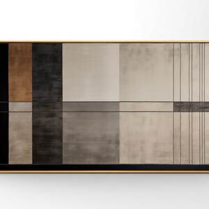 May include: Abstract geometric painting with a gold frame. The painting features a grid of squares in shades of brown, gray, and black.