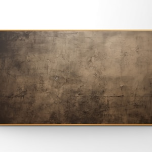 May include: A large, rectangular canvas painting with a textured, brown background. The canvas is framed in a thin, gold frame.