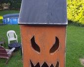 Handmade wooden jack o lantern saltbox house with clip light hole in the back