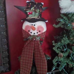 Handmade snowman tree topper