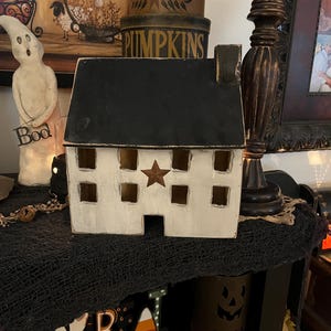 Handmade wooden saltbox house