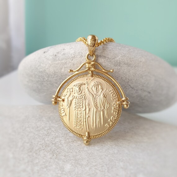 Religious shop coin pendant