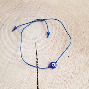 Greek Evil Eye Blue Cord Adjustable Bracelet. Blue Murano Evil Eye.