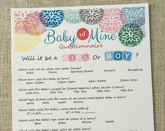 May include: A white questionnaire titled "Baby of Mine" with colorful floral accents. The questionnaire asks about the baby's gender, birth details, and preferences. Includes fill-in-the-blank sections for the baby's name and email address.