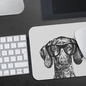 May include: A black and white illustration of a dog wearing glasses. The dog is a Bloodhound with a long snout and floppy ears. The background is a light gray.
