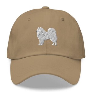 This embroidered Samoyed hat is a perfect gift for dog dad, dog mom, Samoyed lovers, and dog owner. Whether it's a Samoyed beanie, vintage distressed hat, denim hat, corduroy hat or dad hat, it's a cute and funny way to show off your love for your Samoyed dog.