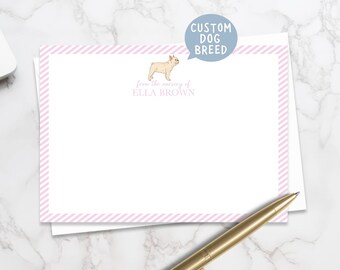 May include: A white stationery set with a pink striped border and a cartoon illustration of a dog. The text "Custom Dog Breed" is in a blue bubble, and the name "Ella Brown" is printed below the dog illustration.
