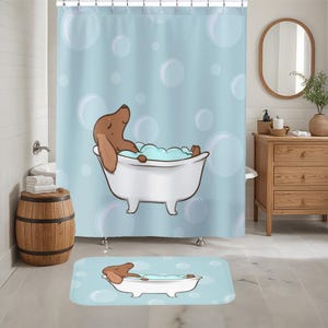 May include: A blue shower curtain featuring a cartoon dachshund enjoying a bath in a white bathtub. The dachshund is brown with a pink nose and is surrounded by white bubbles. The shower curtain has a white background with blue bubbles.