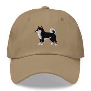 This embroidered Black and Tan Shiba Inu hat is a perfect gift for dog dad, dog mom, Shiba lovers, and dog owner. Whether it's a Shiba Inu beanie, vintage distressed hat, denim hat, corduroy hat or dad hat, it's a cute and funny way to show off your love for your Shiba dog.