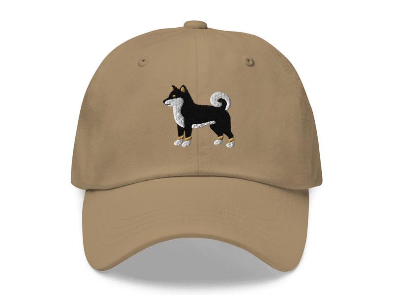 This embroidered Black and Tan Shiba Inu hat is a perfect gift for dog dad, dog mom, Shiba lovers, and dog owner. Whether it's a Shiba Inu beanie, vintage distressed hat, denim hat, corduroy hat or dad hat, it's a cute and funny way to show off your love for your Shiba dog.