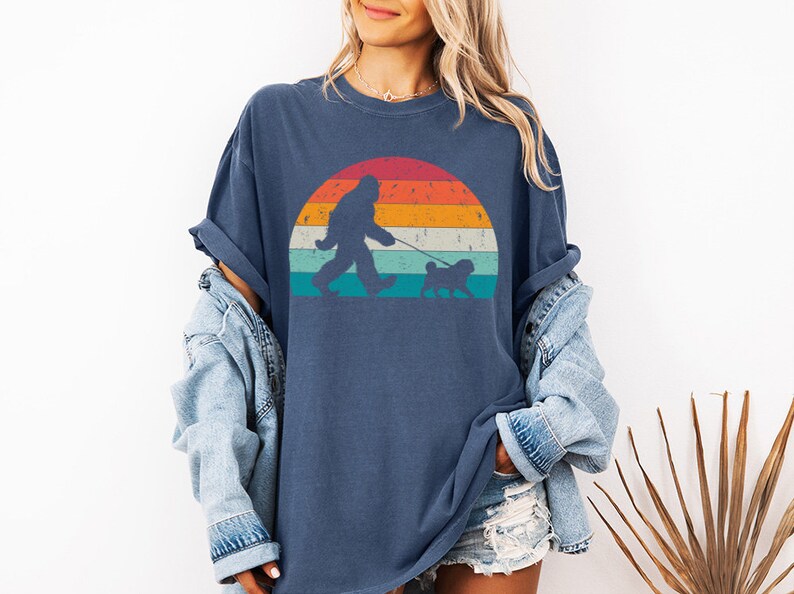 Custom Bigfoot Walking a Dog tshirt with custom dog breed art. This personalized dog shirt is perfect for dog mom, dog dad, dog lovers on Christmas. This is available for dog t-shirt, dog tank top, dog sweatshirt and dog hoodie.