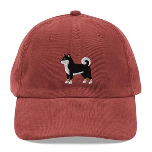 This embroidered Black and Tan Shiba Inu hat is a perfect gift for dog dad, dog mom, Shiba lovers, and dog owner. Whether it's a Shiba Inu beanie, vintage distressed hat, denim hat, corduroy hat or dad hat, it's a cute and funny way to show off your love for your Shiba dog.