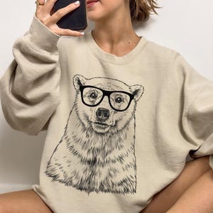 Funny and Cute Nerdy Polar Bear Wearing Glasses shirt for Animal lovers! This Polar Bear art tshirt, tank top, kids tee, youth or sweatshirt is a perfect gift for Polar Bear Lover, and Animal Lovers.
