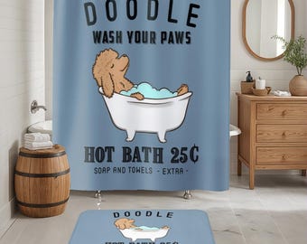 May include: A blue shower curtain with the text "Doodle Wash Your Paws Hot Bath 25c Soap and Towels - Extra -" and a cartoon doodle of a brown dog in a bathtub. A matching blue bath mat with the same text and cartoon dog is on the floor.