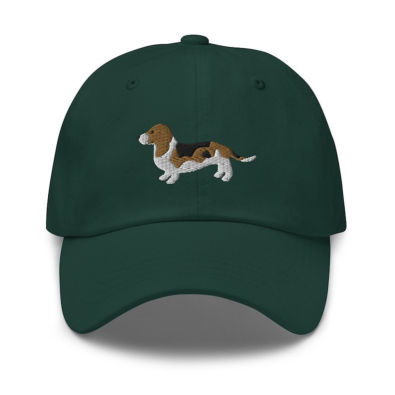 This embroidered Basset Hound hat is a perfect gift for dog dad, dog mom, Basset Hound lovers, and dog owner. Whether it's a Basset Hound beanie, vintage distressed hat, denim hat, corduroy hat or dad hat, it's a cute and funny way to show off your love for your Basset Hound dog.